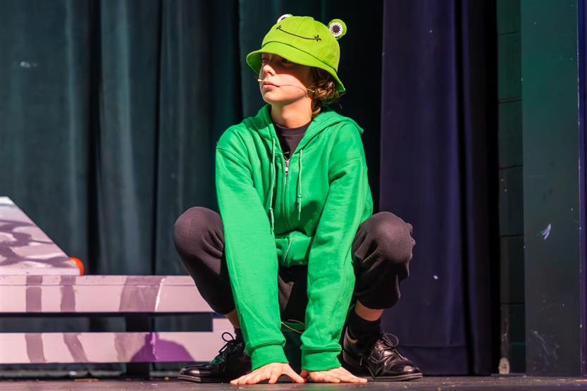 Students perform onstage